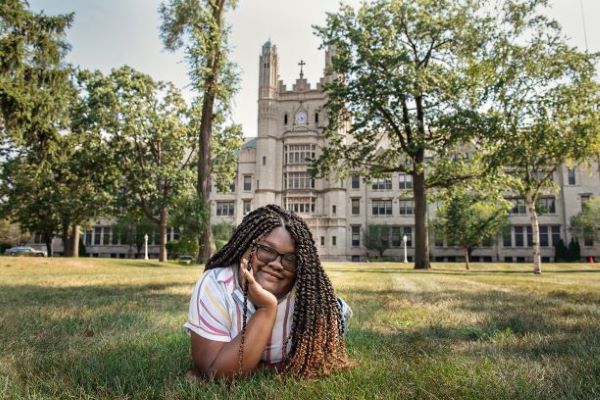 Kaelyn Walker in front of Marygrove