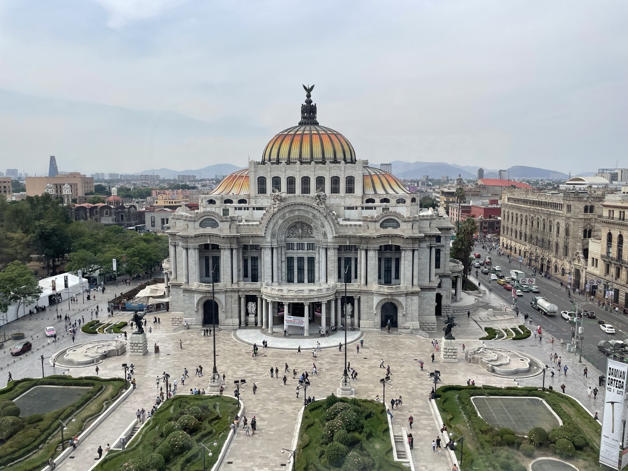 The Bellas Artes building, a prominent landmark in Mexico City with a marble structure and domed roof.