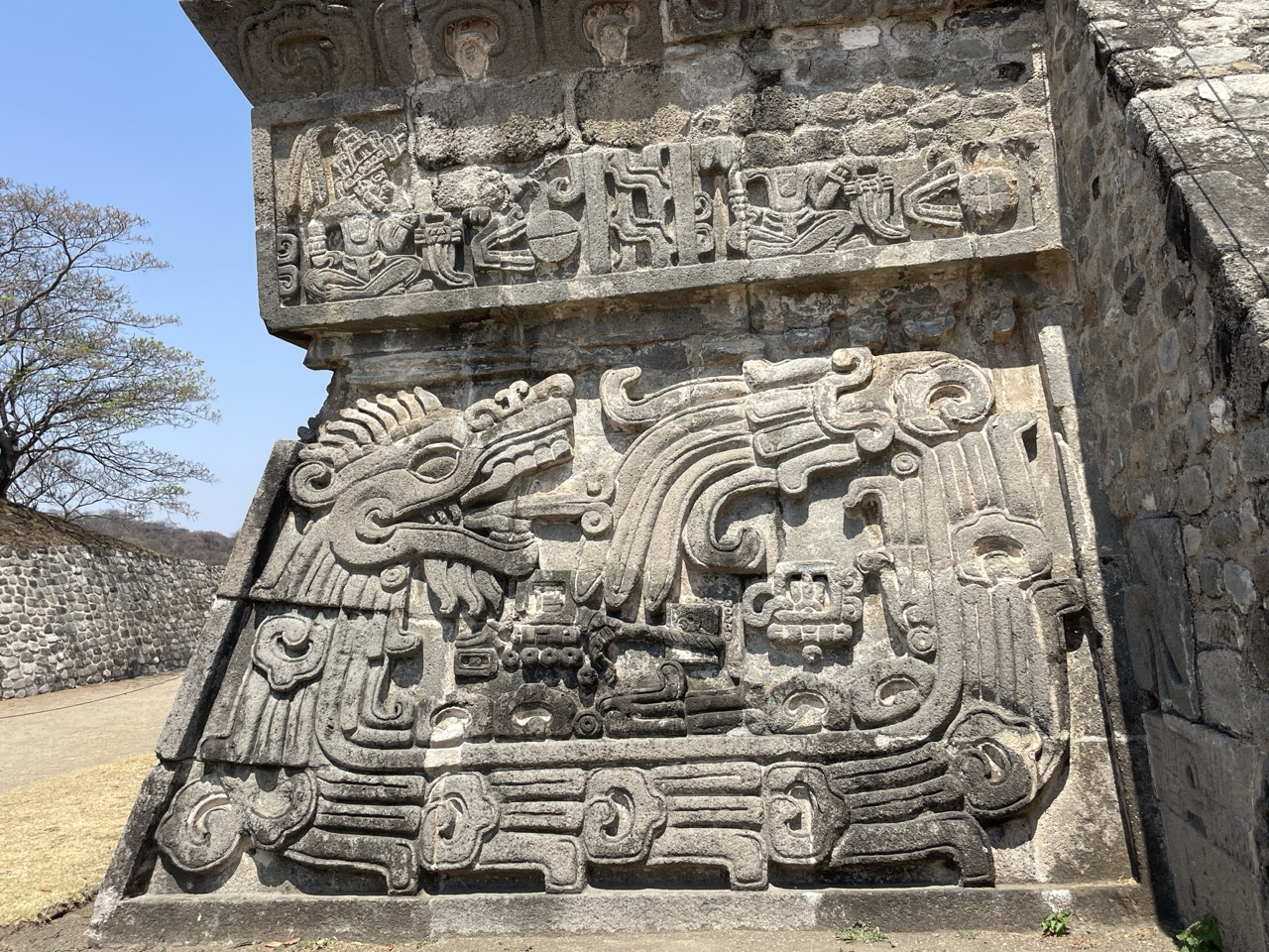 The closeup shot of the pyramids at Xochicalco show the careful design work in the rock of a serpent.