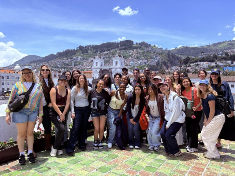 U of M undergrads pose with Susan on a field trip to Antisana National Park in Ecuador as part of their class EDUC 215: Exploring Education.