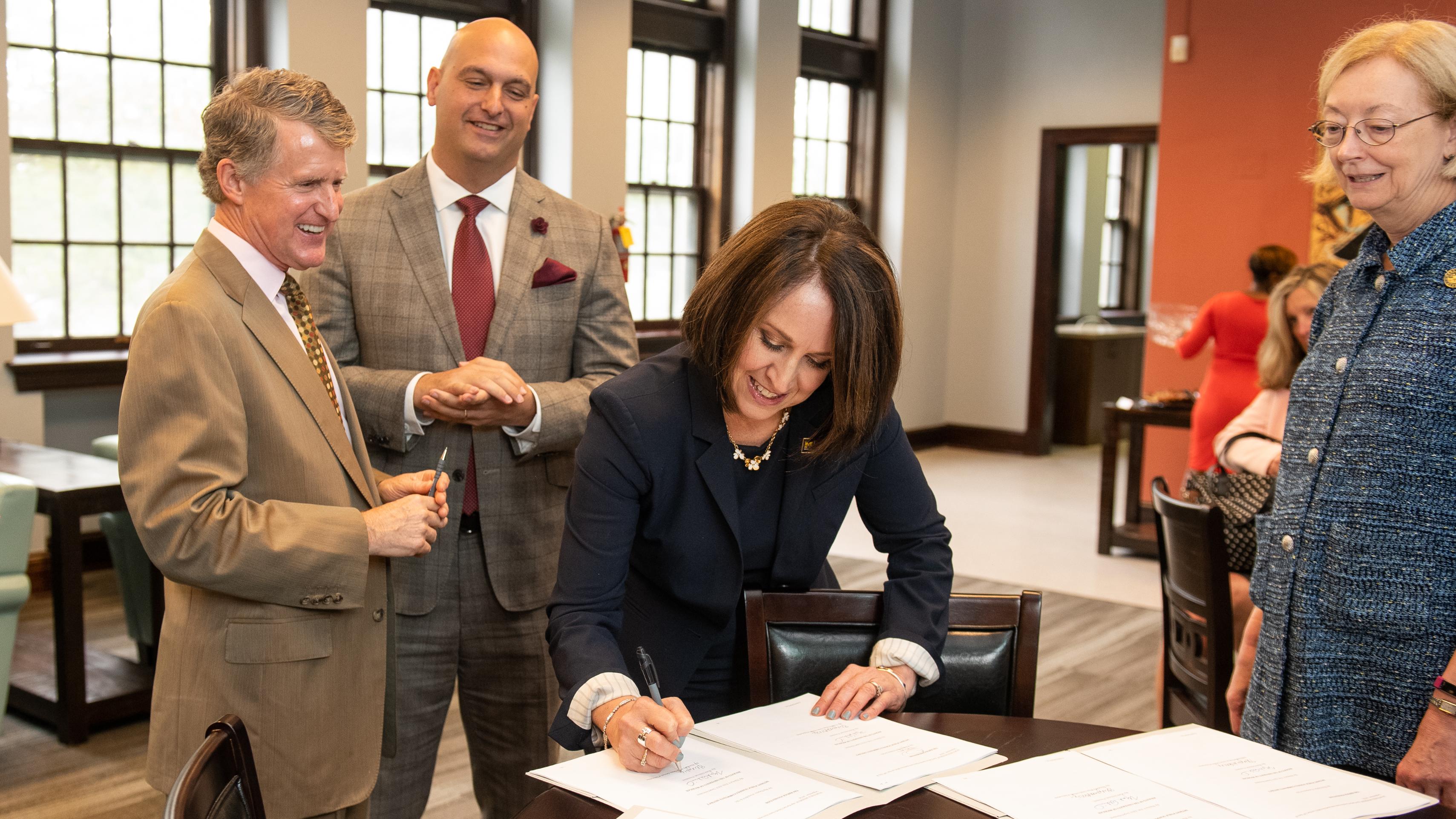 Moje, Rapson, and Vitti signing Detroit P-20 agreement 