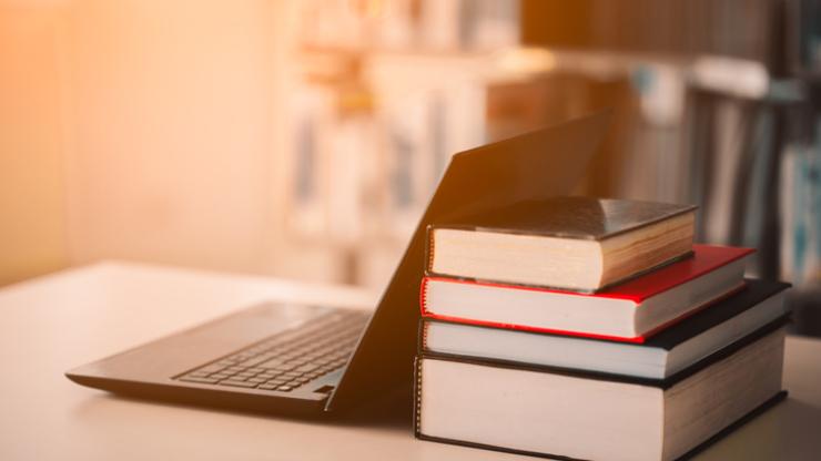 Books and laptop computer