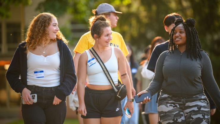 Prospective students walk across the Marygrove campus.