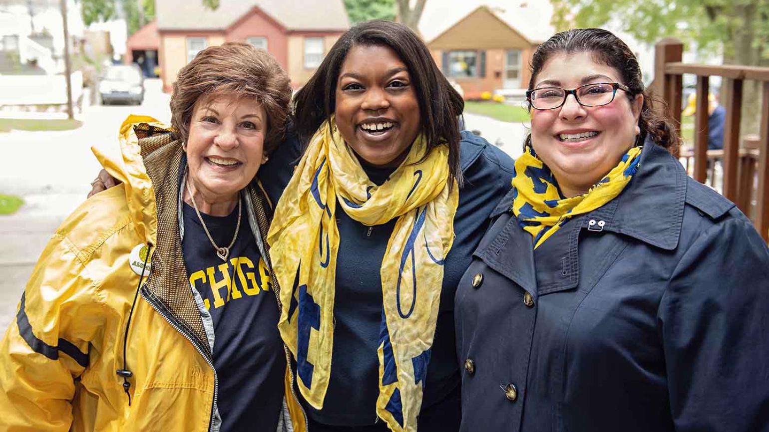 SOE tailgaters pose for a photo