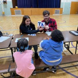 Mousa working with students