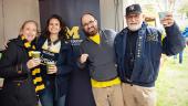 Alumni at tailgate party