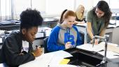 Teaching intern working with Lincoln High School students