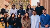Students and 2 faculty in the Belonging as Legacy project pose outdoors together