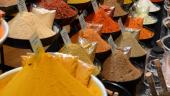 Multicolored spices for sale in an open air market