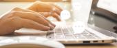 Photo of hands typing on a laptop keyboard, overlaid with graphic of chat bubbles emerging rising from keyboard